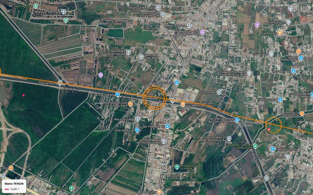 Ga trung chuyển vòng tròn kép của tuyến metro số 1 tại điểm cắt đường Vĩnh Lộc, gần kênh Trung Ương